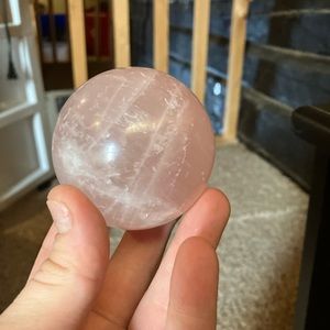 Pink quartz crystal sphere